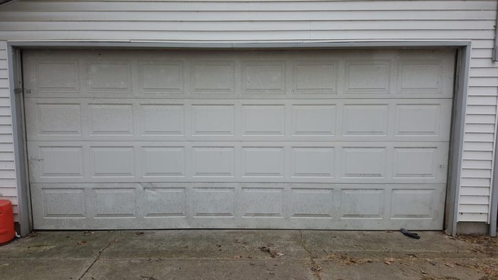 Repaired garage door — after