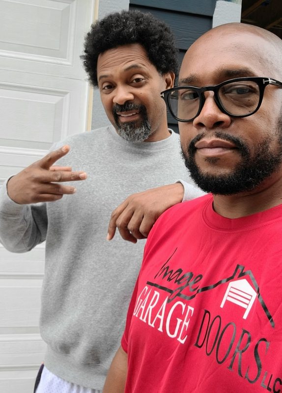 Kevin Smith of Image Garage Doors with a satisfied customer
